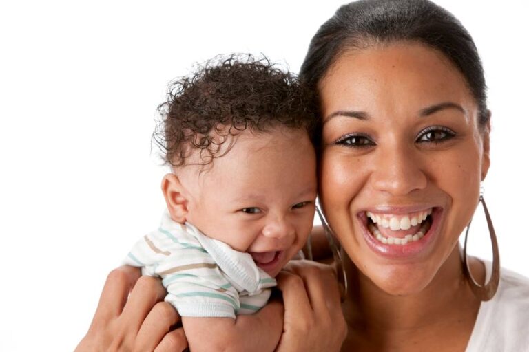 A woman and her happy baby