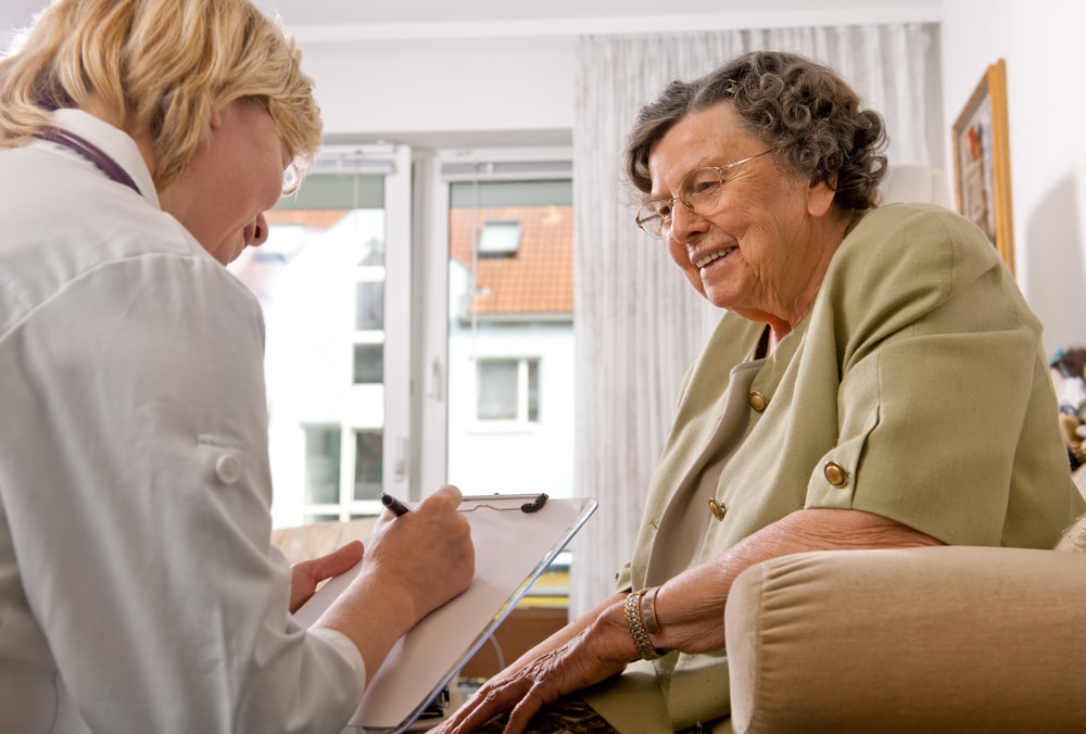 A doctor and a senior patient