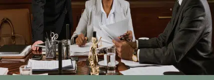 Injury attorneys discussing paperwork