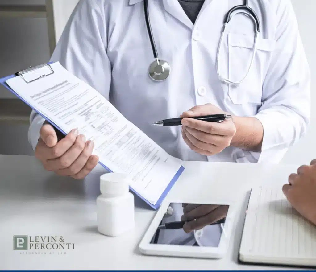 Doctor reviewing document with patient
