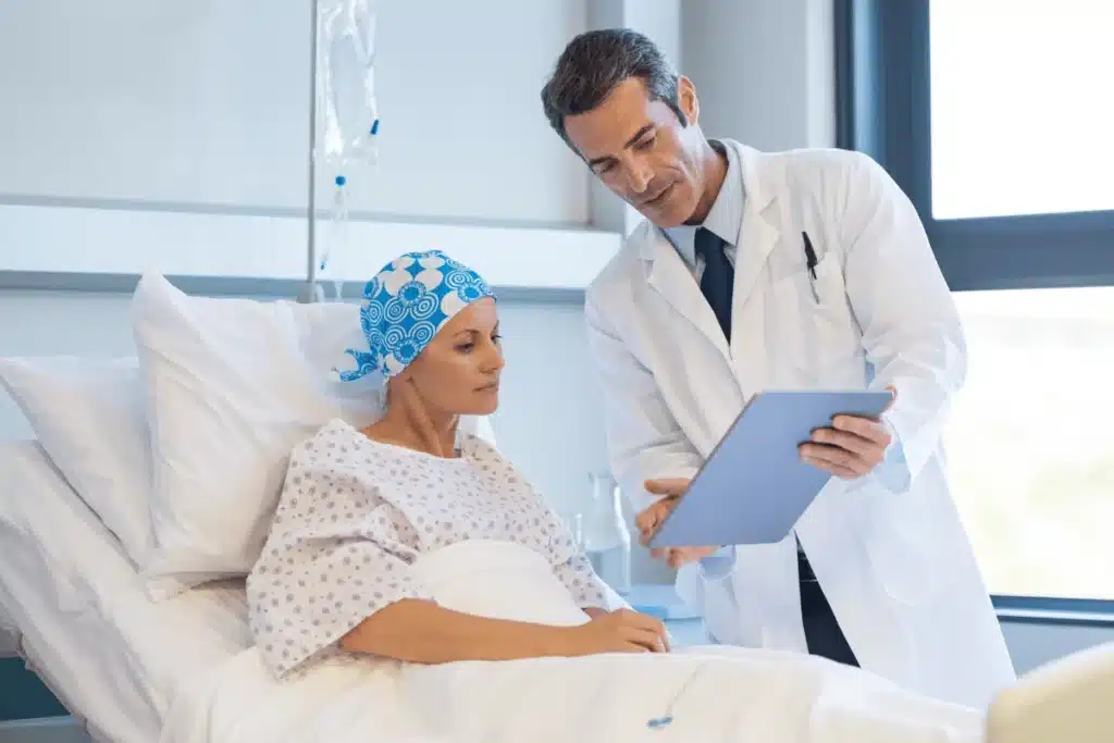 A doctor explaining a cancer diagnosis to a patient