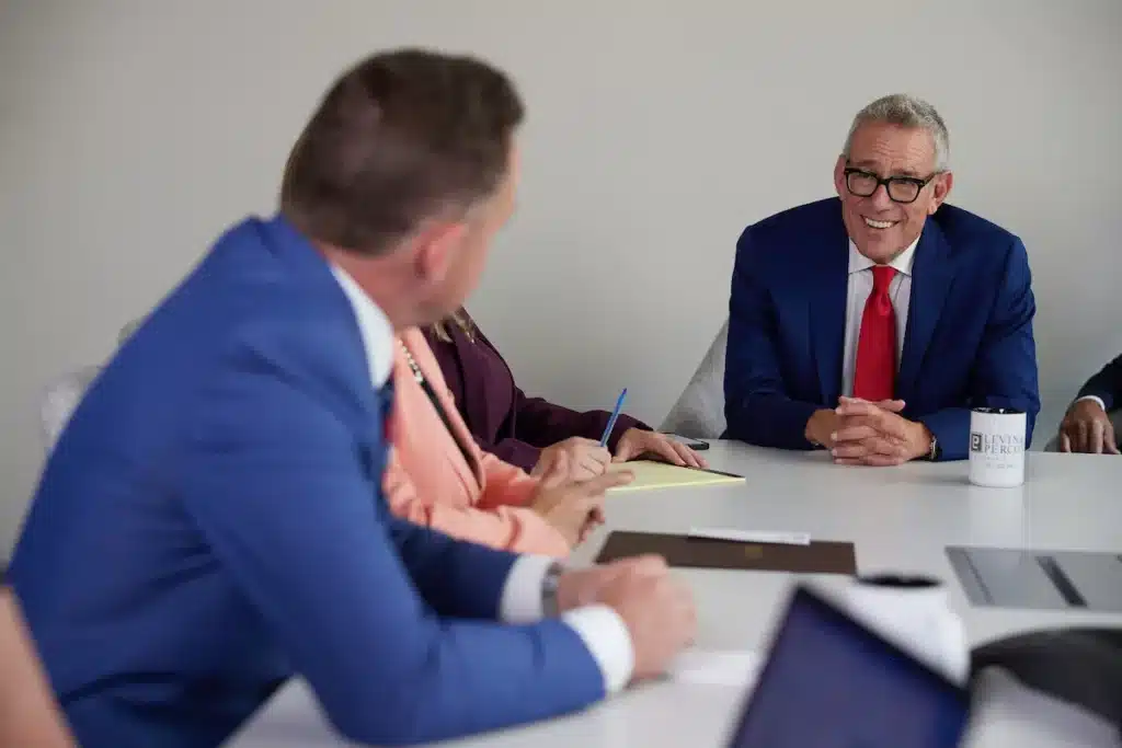 Levin Perconti team in a meeting