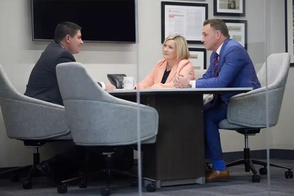 Levin Perconti attorneys in a meeting