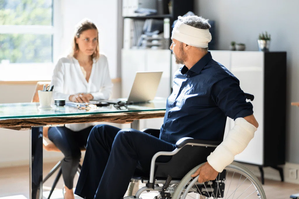 Injured man from Chicago talking with a personal injury attorney