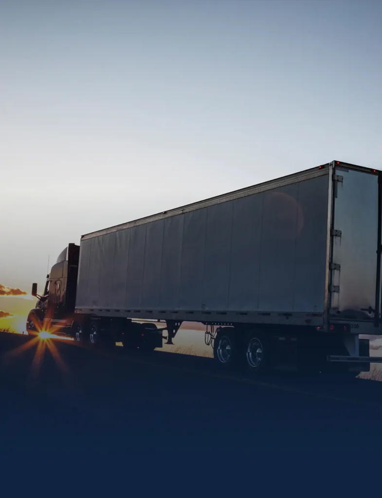 Semi-truck and trailer driving on the highway