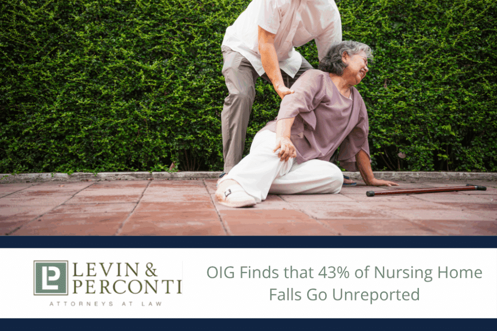 Elderly woman who has fallen on a patio being helped up by a man