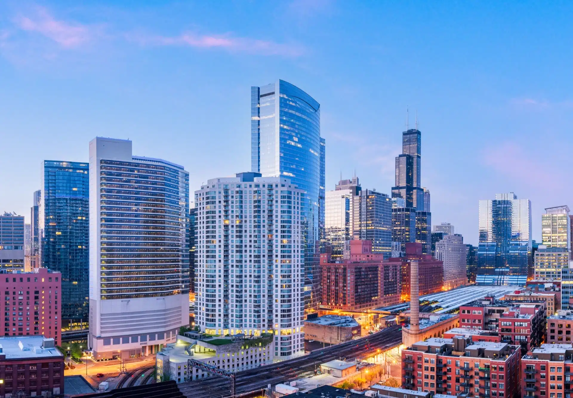 Chicago Illinois skyline at dusk tall skyscrapers and city lights