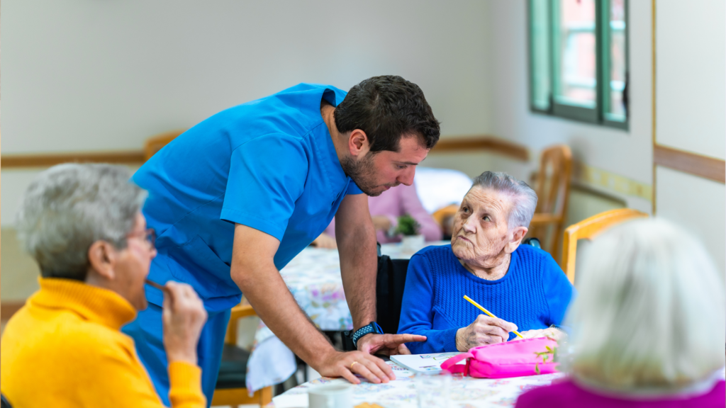 a nurse at a nursing home checking up on a resident
