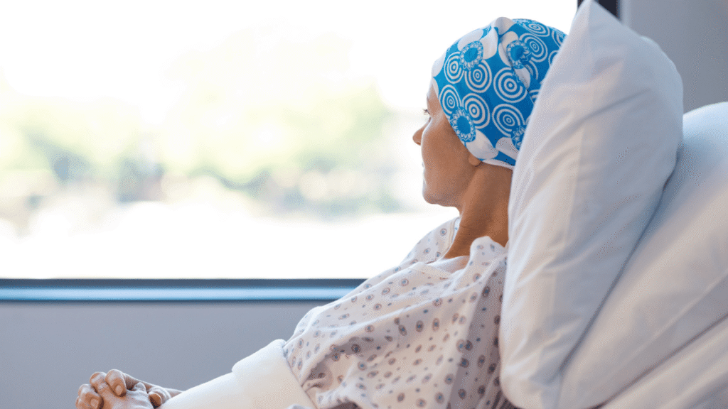 a cancer patient at a hospital looking out the window
