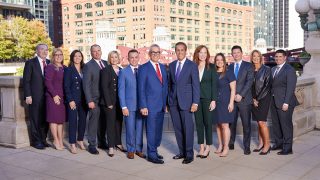 Partners at Levin & Perconti, national medical malpractice attorneys with backdrop of downtown Chicago, IL